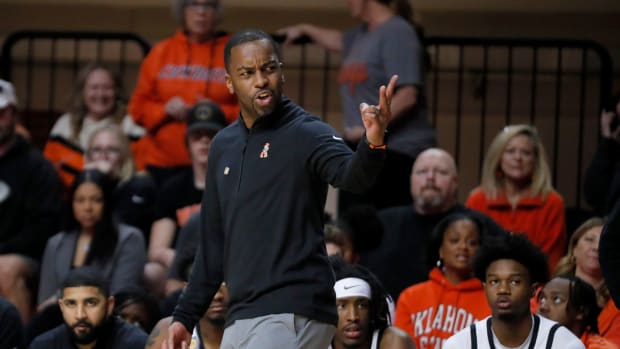 Oklahoma State Cowboys head coach Mike Boynton gestures to an official during a college basketball game between the Oklahoma State Cowboys (OSU) and the Eastern Washington Eagles in the second round of the NIT at Gallagher-Iba Arena in Stillwater, Okla., Sunday, March 19, 2023. Oklahoma State won 71-60. Osu Nit